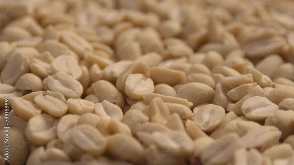 Whole shelled peanut nuts kernels close-up. Smooth rotation motion Whole shelled peanut nuts kernels close-up. Smooth rotation motion