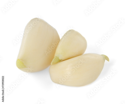 Peeled cloves of fresh garlic isolated on white