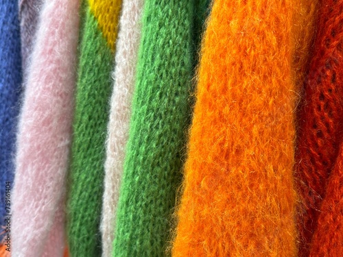 Vászonkép Wool mohair colorful warm clothes textile fabric close up.