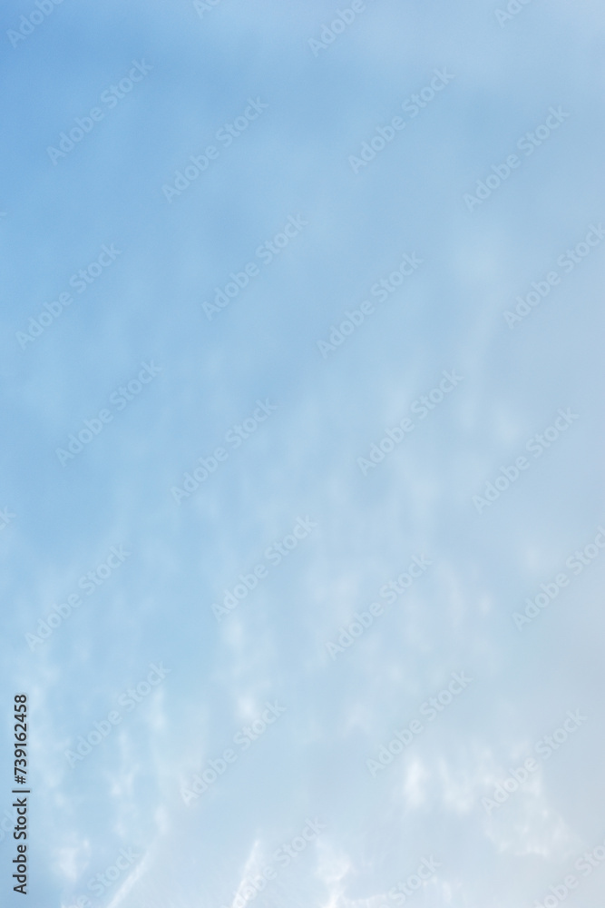 Defocused abstract background blue water, wave texture, blue gradient colored. Different blue tints sea water as vertical blurred wallpaper, fon, backdrop, design elements. Pastel colored tones Defocused abstract background blue water, wave texture, blue gradient colored. Different blue tints sea water as vertical blurred wallpaper, fon, backdrop, design elements. Pastel colored tones