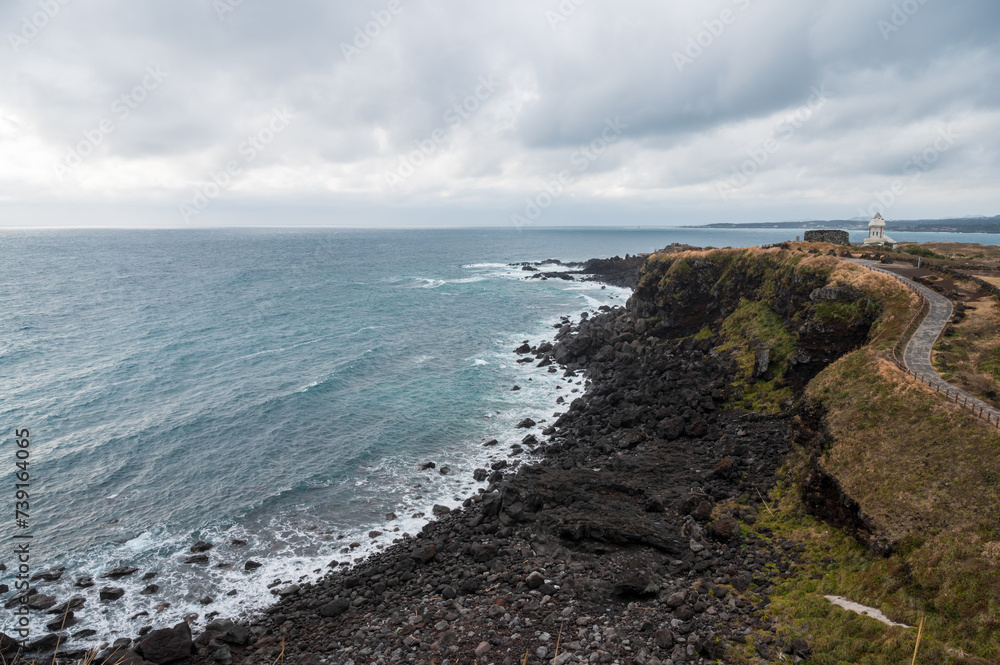 Jeju Island's natural scenery on a cloudy day by the sea.
