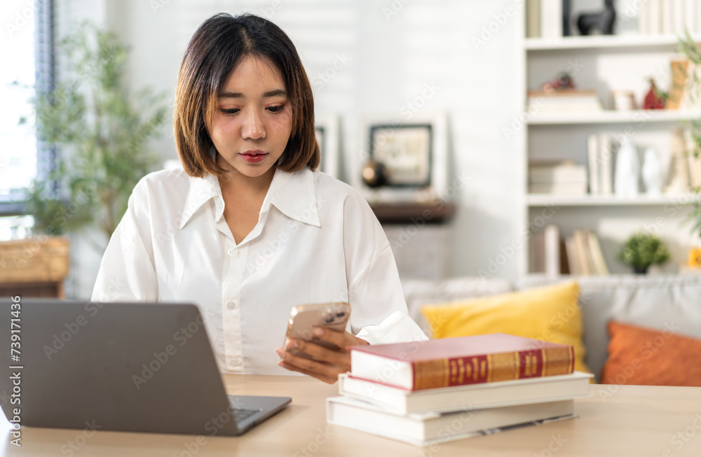 Young smiling asian woman happy relax use laptop conference work,learning, education, shopping, study online, webinar, online marketing, business, blog, digital internet advertising at home Young smiling asian woman happy relax use laptop conference work,learning, education, shopping, study online, webinar, online marketing, business, blog, digital internet advertising at home