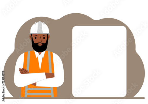 A male builder in a hardhat and an orange vest stands near a large white sheet.
