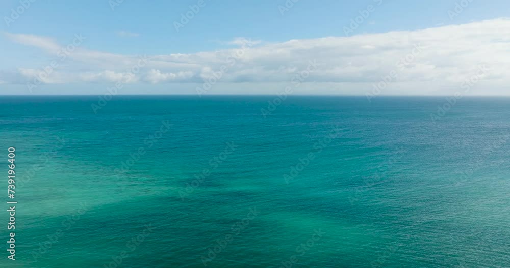 Aerial view of blue sea surface and turquoise water with corals. Santa Fe, Tablas, Romblon. Philippines. Aerial view of blue sea surface and turquoise water with corals. Santa Fe, Tablas, Romblon. Philippines.