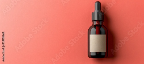Serum dropper bottle mockup on abstract pastel color background with light, shadows, and copy space photo