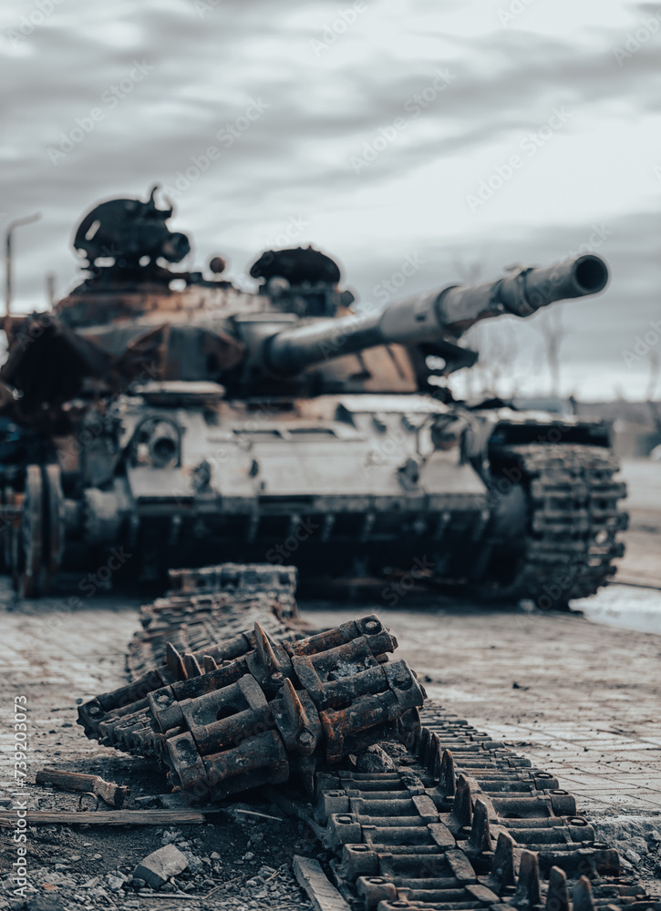 damaged military tank on a city street in Ukraine damaged military tank on a city street in Ukraine