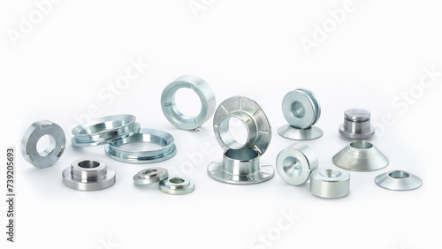 An assortment of nuts and bolts on a white background