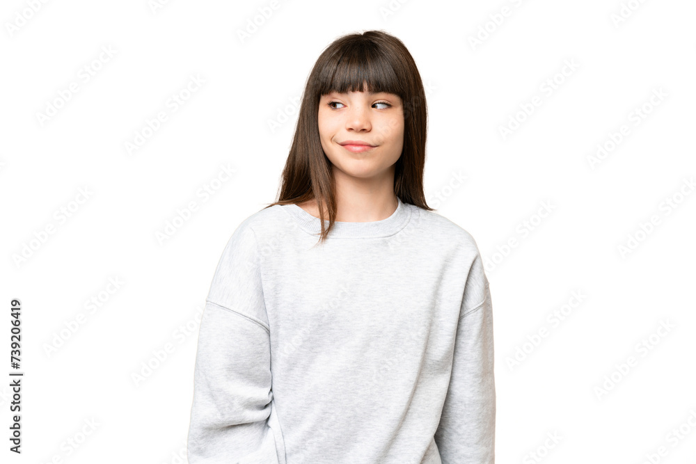 Little girl over isolated green chroma key background making doubts gesture looking side Little girl over isolated green chroma key background making doubts gesture looking side
