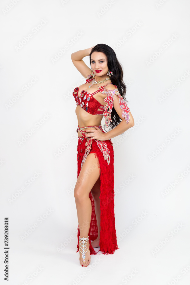 Photo middle-aged dancer in a red variety costume. Photo middle-aged dancer in a red variety costume.