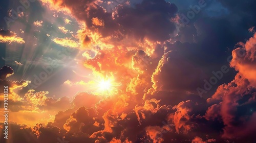 As the sun sets behind a blanket of clouds  its amber glow casts a lens flare and fills the sky with a warm afterglow  bringing a sense of tranquility and beauty to the outdoor scene