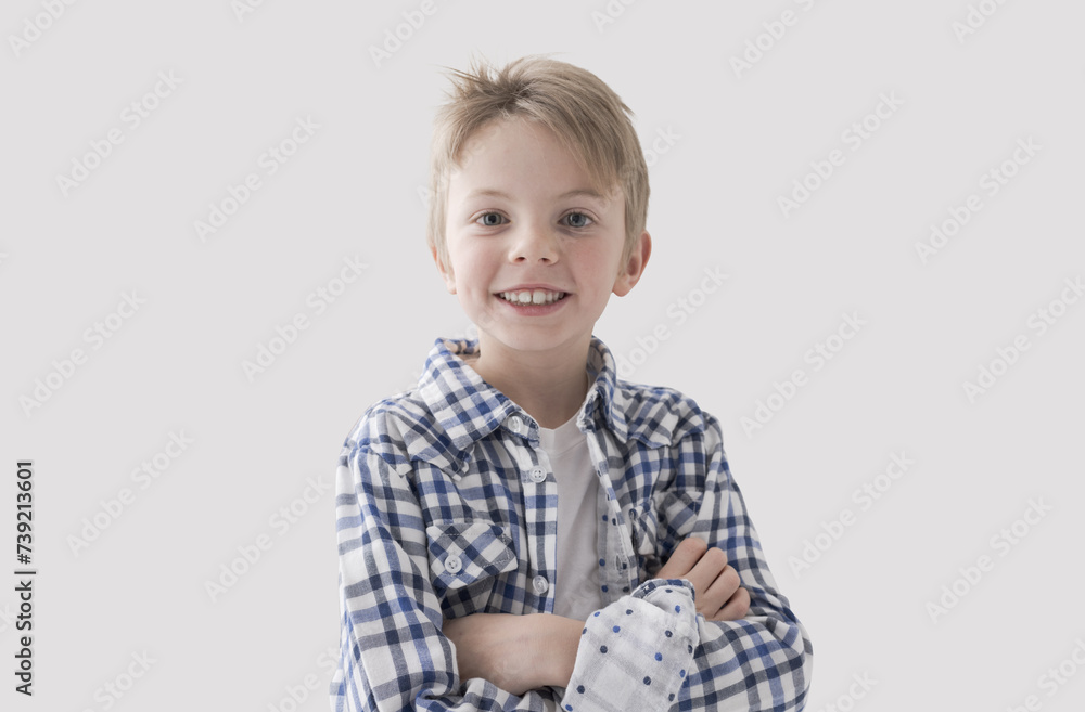 Cute boy posing with arms crossed Cute boy posing with arms crossed