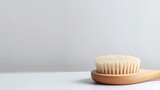Natural bristle brush on a white background