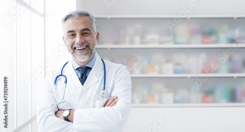Smiling pharmacist posing in the pharmacy