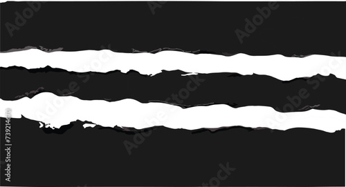Three torn strips of elongated black paper