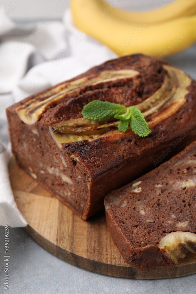 Delicious banana bread on grey table, closeup Delicious banana bread on grey table, closeup