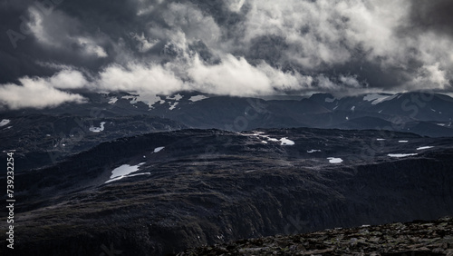 Dark mountain views in Norway during a storm. photo