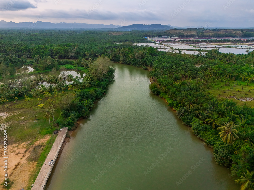 Forests and canals from an aerial view. Top angle Nature and water. Photo for using backgrounds, trees, and flowing streams