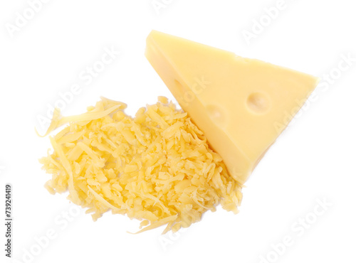 Grated and whole piece of cheese isolated on white, top view