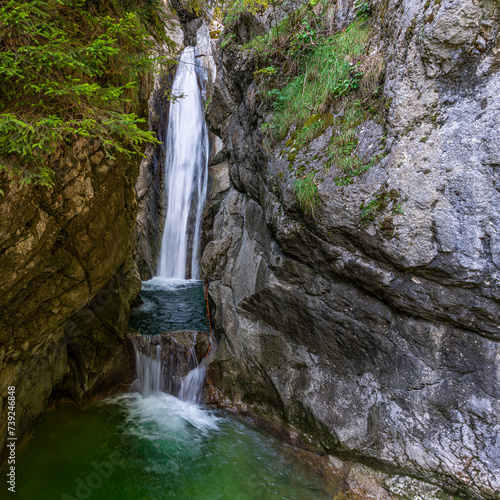 Kaskaden-förmiger Wasserfall Tatzelwurm in Bayerischzell photo