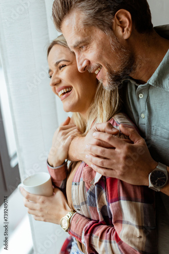 Tender Embrace by the Windo...