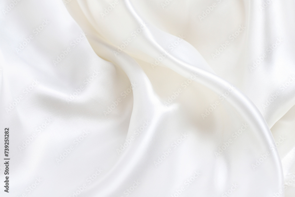 Obraz premium Wavy abstract white silk background.
