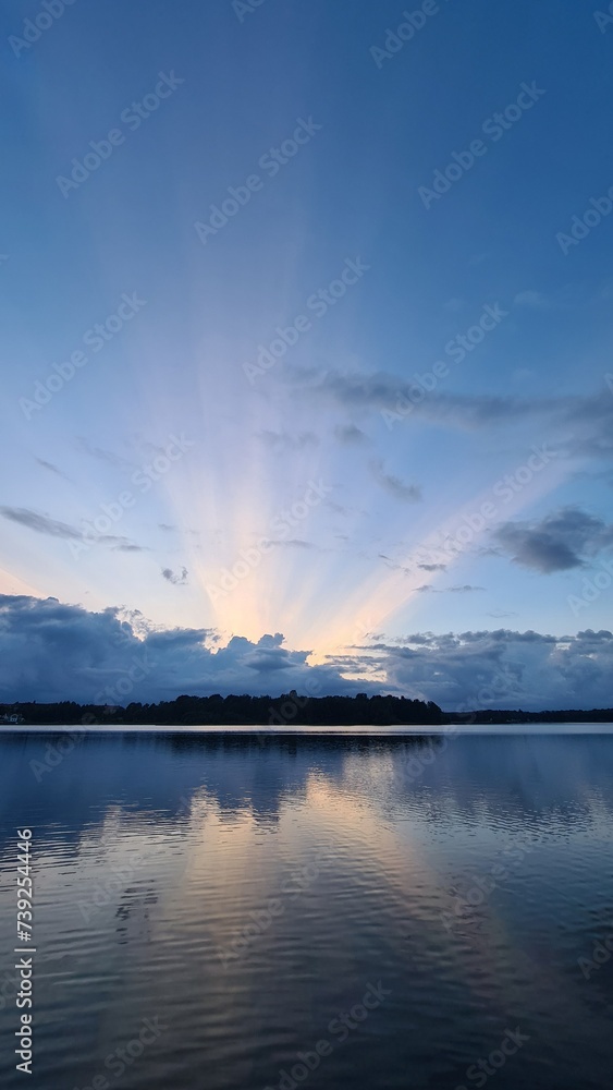 Sunbeams over a lake in sweden