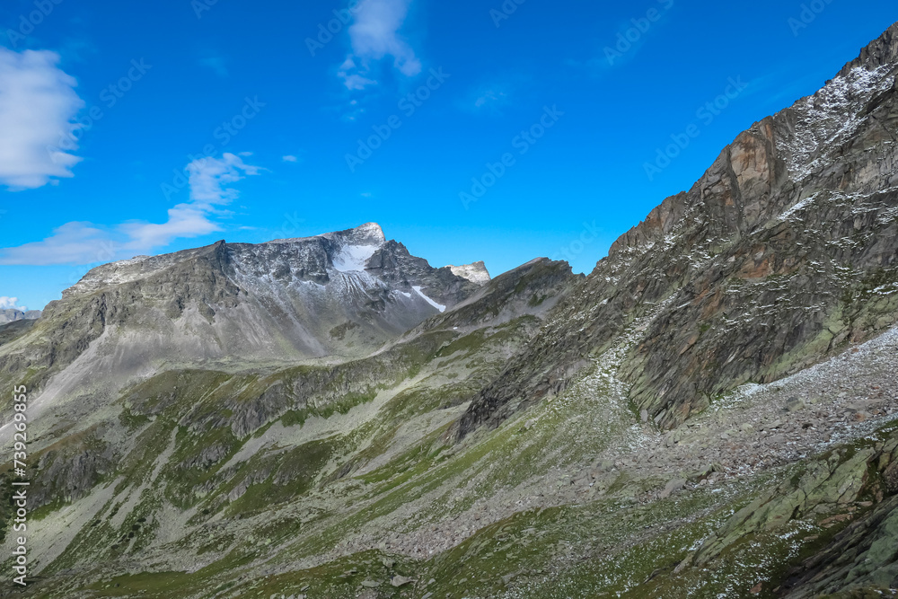 Panoramic view of majestic mountain peak of Gamskarlspitz in High Tauern National Park, Carinthia, Austria. Idyllic hiking trail in Austrian Alps. Hike paradise Mallnitz. Wanderlust in summer. Escape