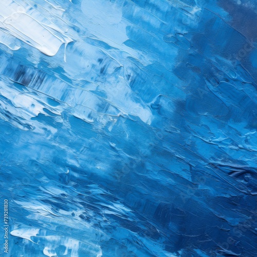 Abstract background of blue acrylic paint on canvas with cracks and scratches
