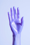 Hand in a violet dishwashing glove.Minimal cleanliness concept.Copy space,top view,flat lay.Generative AI