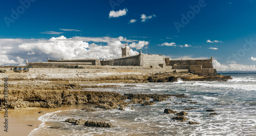 The San Julian (São Julião) lighthouse, located in the fort of the same name, and situated on a headland on the north bank of the River Tagus estuary in Oeiras, Lisbon District, Portugal.