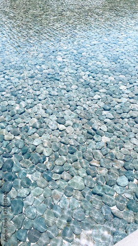 A lot of stones in the clear water