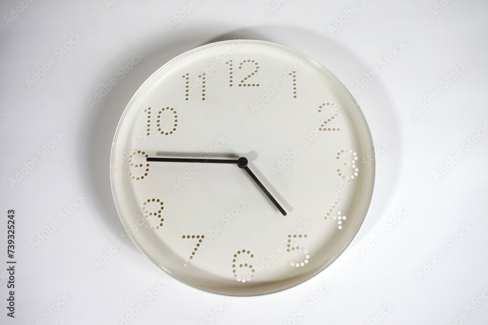 White wall clock isolated on a white background White wall clock isolated on a white background