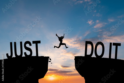 Man jumping on I can do it or I can t do it text over cliff on sunset background  Business concept idea.