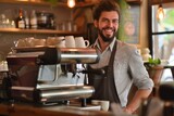 Cheerful male barista smiling behind the espresso machine at a cozy cafe.