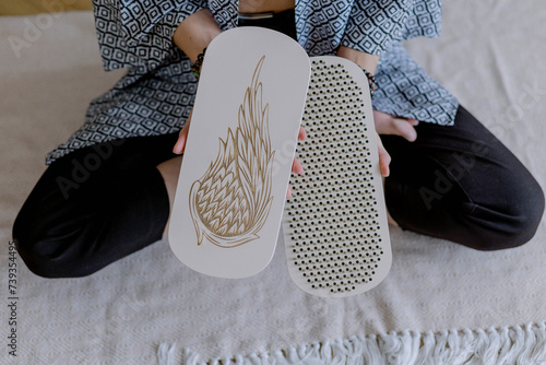 Shelf with decorative items above the sofa