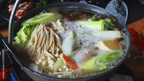 Nabe, Shabu-shabu, Sukiyaki Japanese food. Hot pot. Nabe is boiling in a hot pot.Japanese food in Thai style.