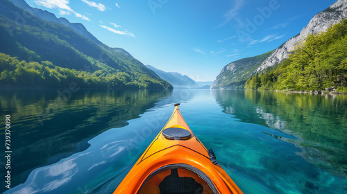 Kayaking Adventure in Crystal Clear Mountain Lake © Jiratchaya