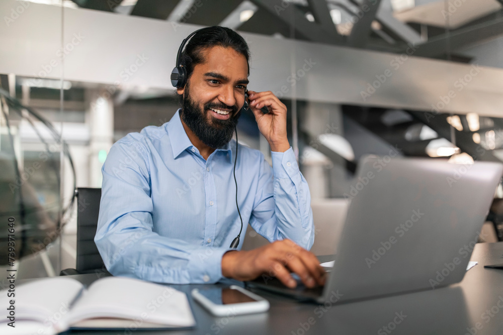Indian Customer Support Manager Man In Headset Working With Laptop Indian Customer Support Manager Man In Headset Working With Laptop