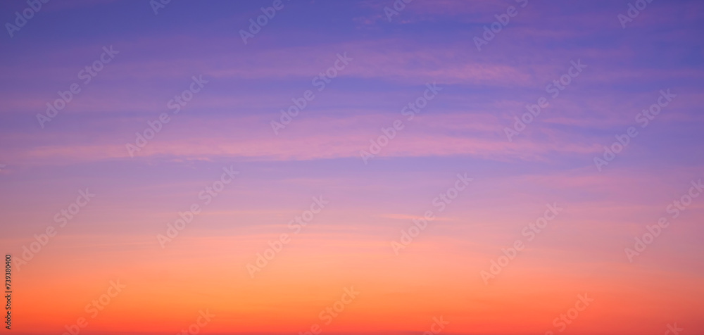 Beautiful evening sky background with colorful sunset cloud on dramatic twilight sky in panoramic view 