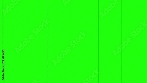 Animation of the movement of black shabby retro stripes on a green screen. Effect of an old TV with interference, distortion, black stripes and flicker on green screen. Chromakey with retro effect. photo