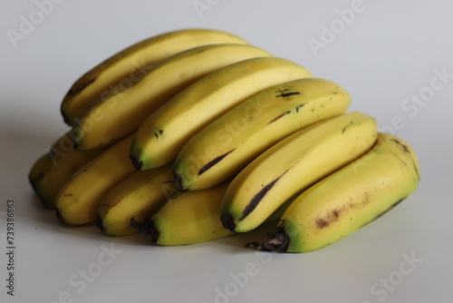 Robusta banana. Vibrant cluster of a dozen premium Robusta bananas, ripe and bountiful photo
