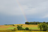 rainbow on summer landscape