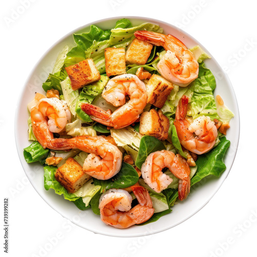 Caesar salad with prawns on a plate. 