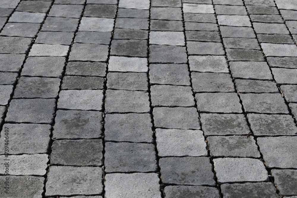gray paving slabs as a background, pavement paved slabs as a background