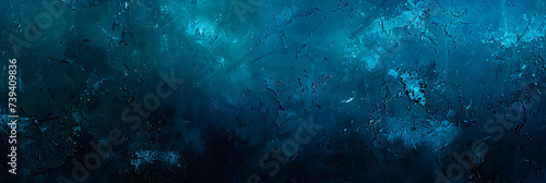 Rich shades of dark blue and teal create a serene atmosphere in this image. Against a rough abstract background, bright lights and glow illuminate the space