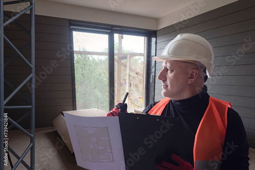Man builder in building. En...