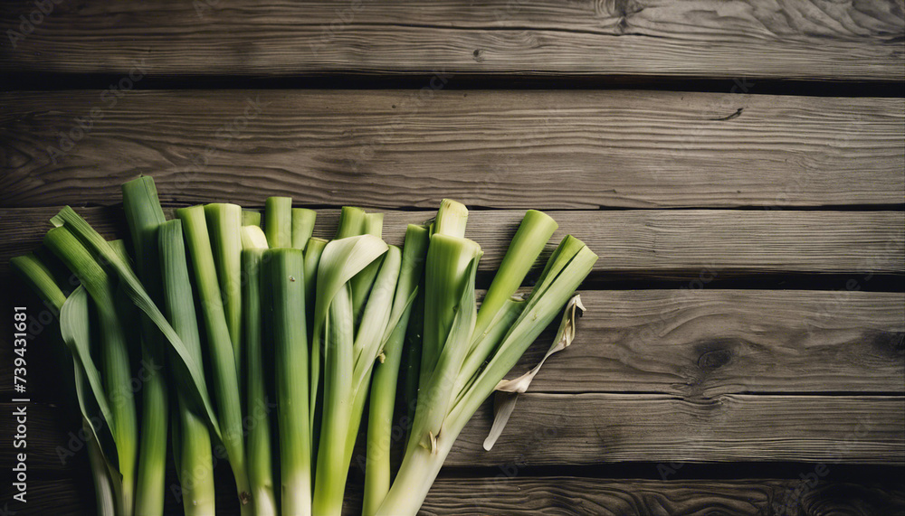 fresh and organic leeks, on old wooden desk
fresh and organic leeks, on old wooden desk