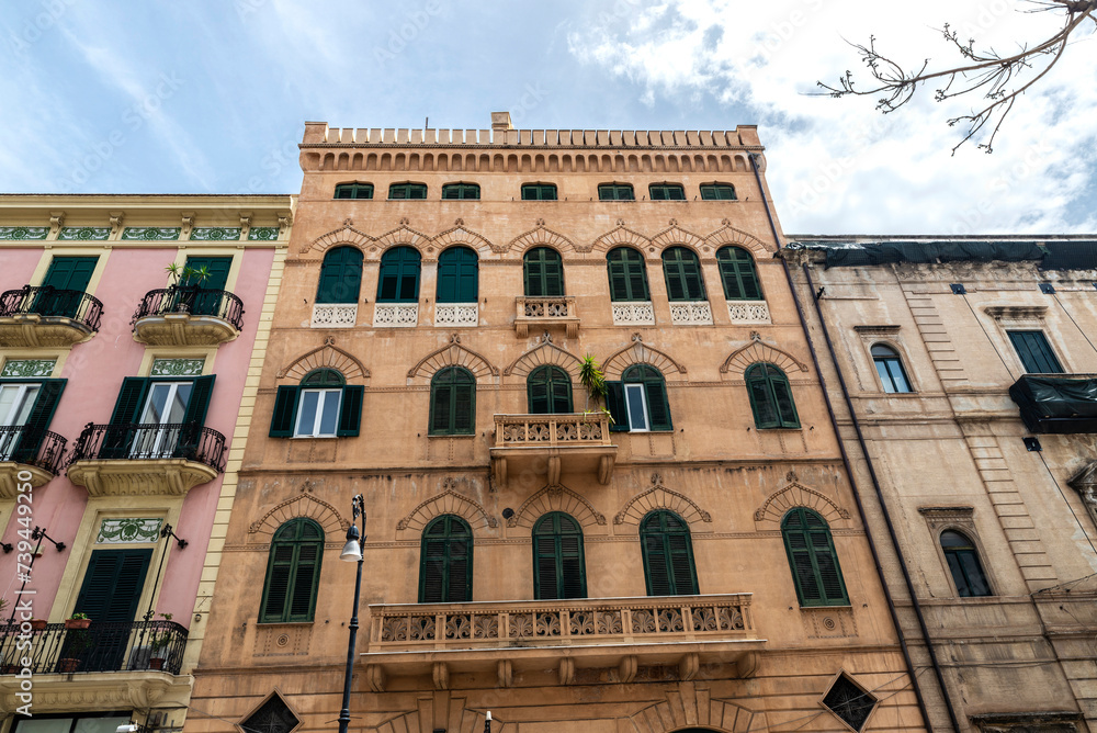 Facade of old classic buildings in Palermo, Sicily, Italy