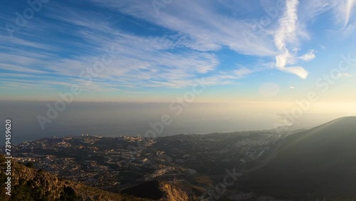 Sunset over Mediterranean sea  and Fuengirola from Calamorro peak, Costa del Sol, Andalusia, Spain photo