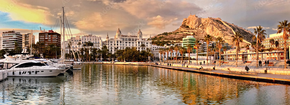 Panoramic view of Alicante harbor and old town on the Mediterranean sea.